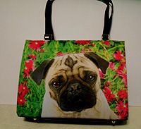 Pug Purse 1 This shoulder strap bag features a sweet pug with a backdrop of pink flowers and greenery. Box style bag. Measures 10.00" X 7.7" X 3.00 (25.40X19.56X7.62 cm)